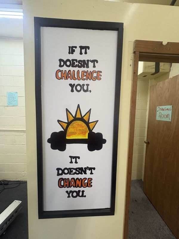 Gym wall sign: If it doesn't challenge you, it doesn't change you