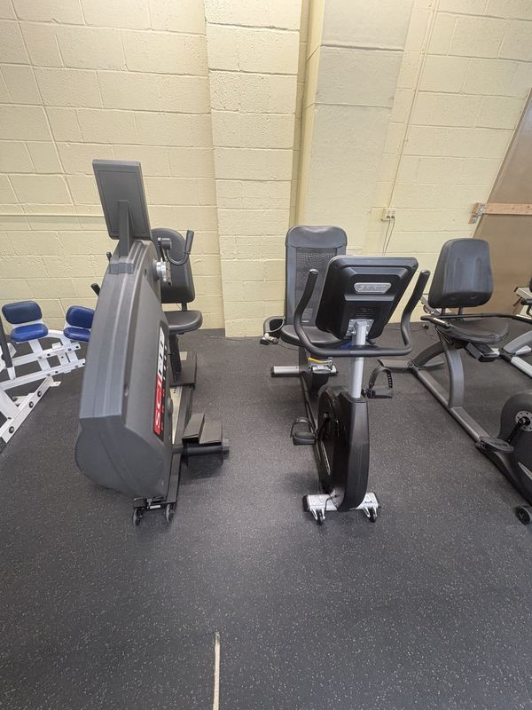 Ellipticals and a recumbent bike in the cardio zone