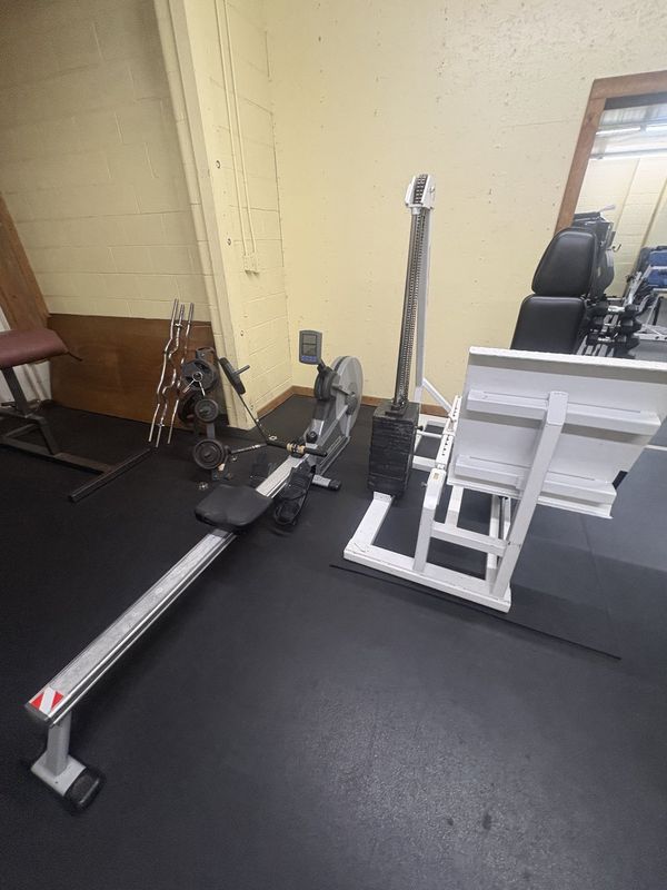 Weight benches beside the window
